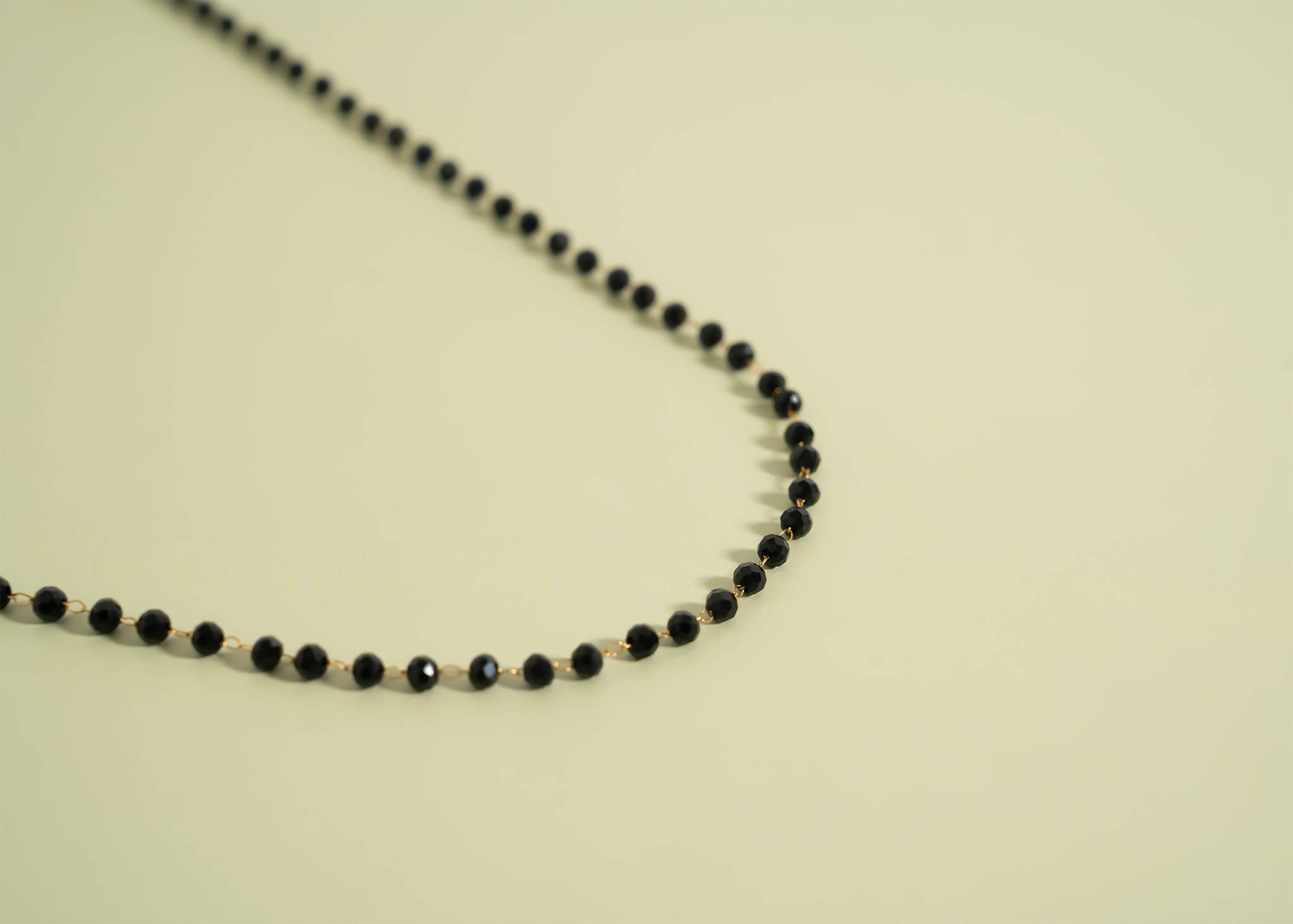 The Black Beaded Chain