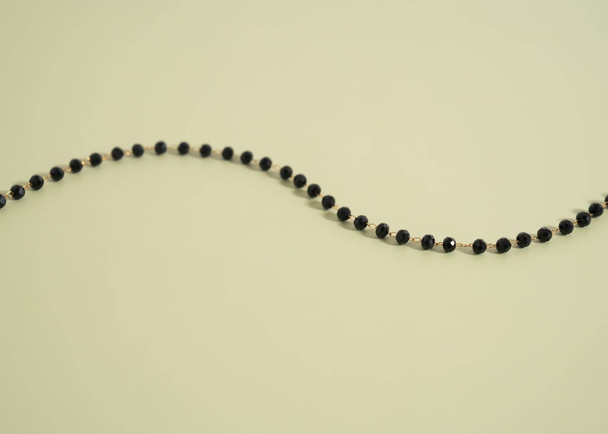 The Black Beaded Chain